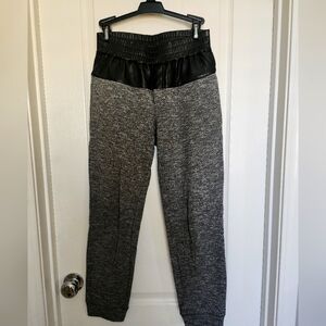 Sweat pants with leather details
